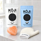 Die vier Produkte des Kōji Sets nebeneinander auf einer Badezimmerablage aus Stein.