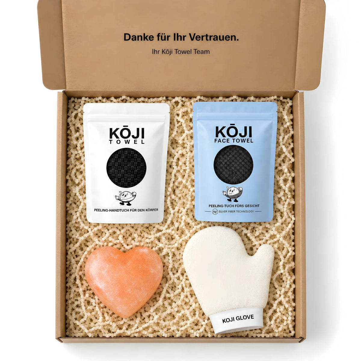 Blick von oben in die geöffnete Kōji Set-Box – alle vier Produkte nebeneinander.